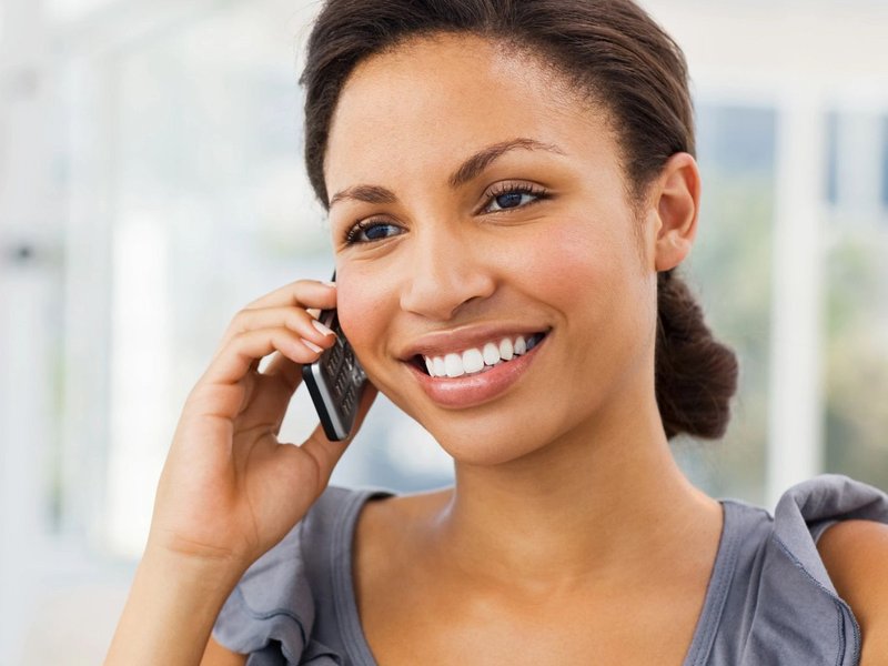 Woman on phone contacting Castillo's Carpet Shack