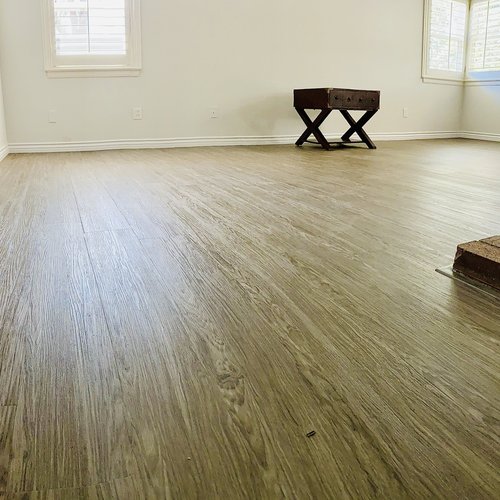 hard flooring in living room - Castillo's Carpet Shack in Riverside, CA