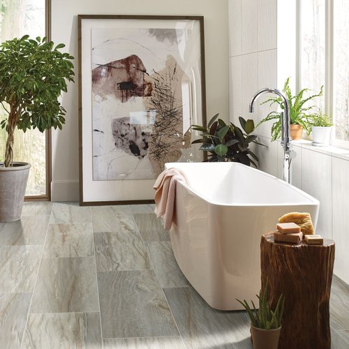 bathroom with standalone tub on hard flooring - Castillo's Carpet Shack in Riverside, CA