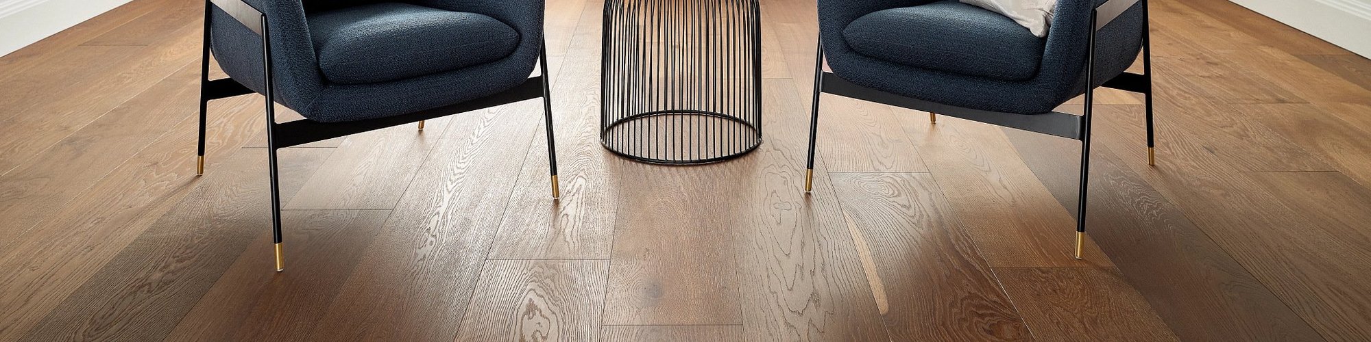 two chairs on hardwood flooring - Castillo's Carpet Shack in Riverside, CA