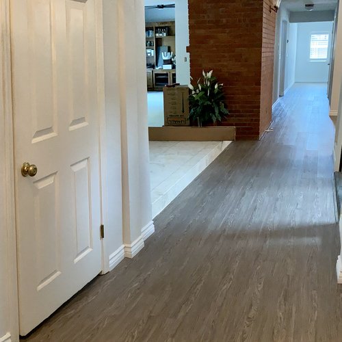 hard flooring in hallway - Castillo's Carpet Shack in Riverside, CA